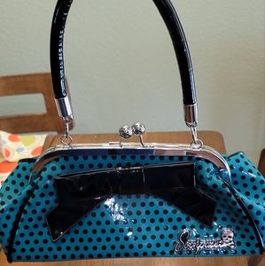 Sourpuss purse